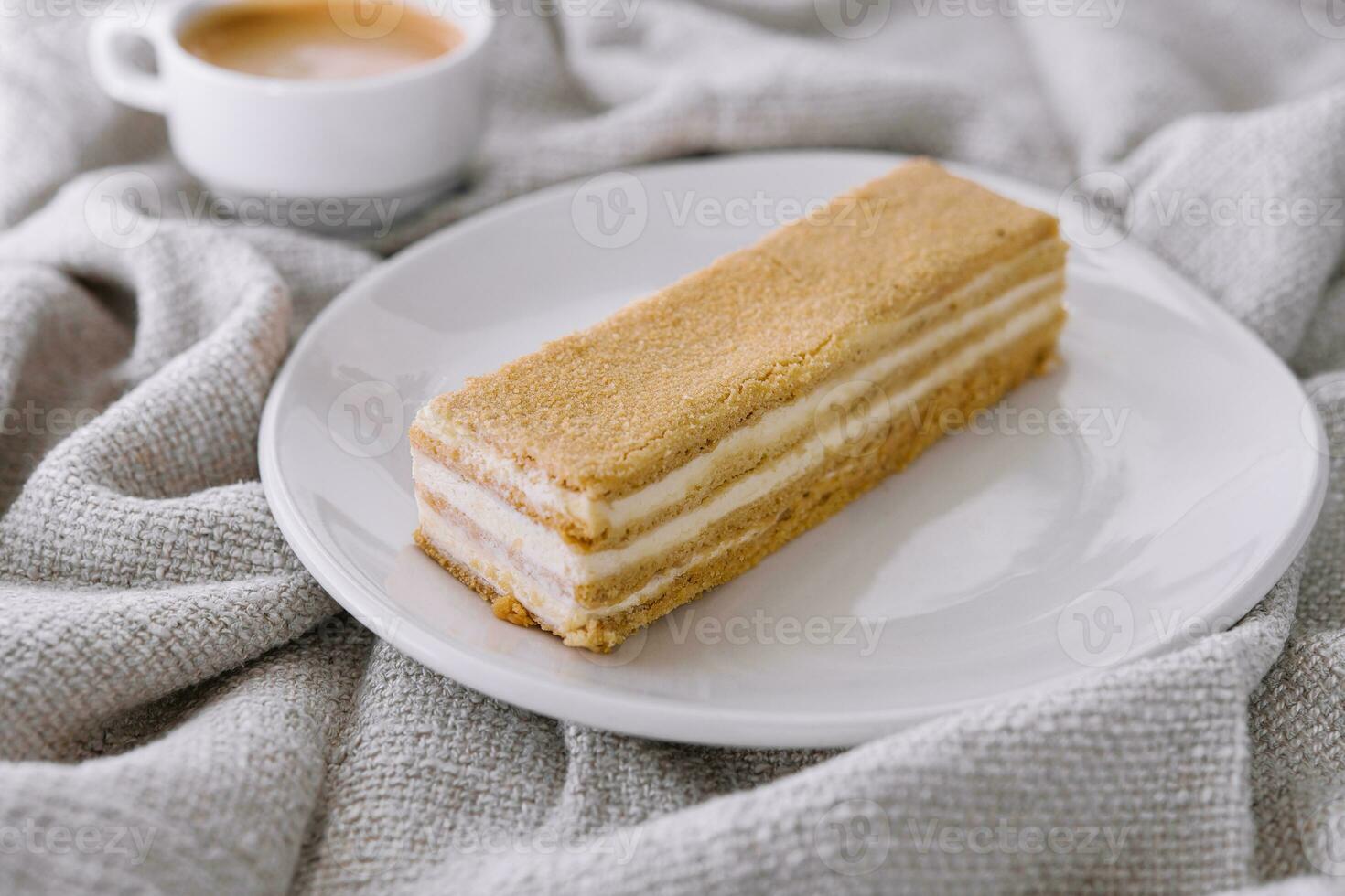 Napoleon cake slices with cup of coffee photo