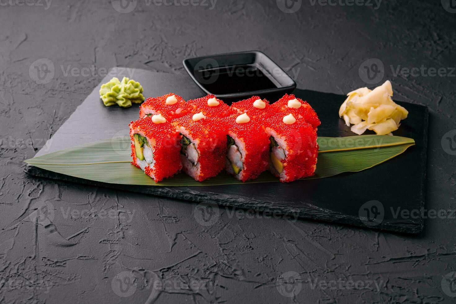 Sushi, rolls, California uramaki with tobiko caviar photo