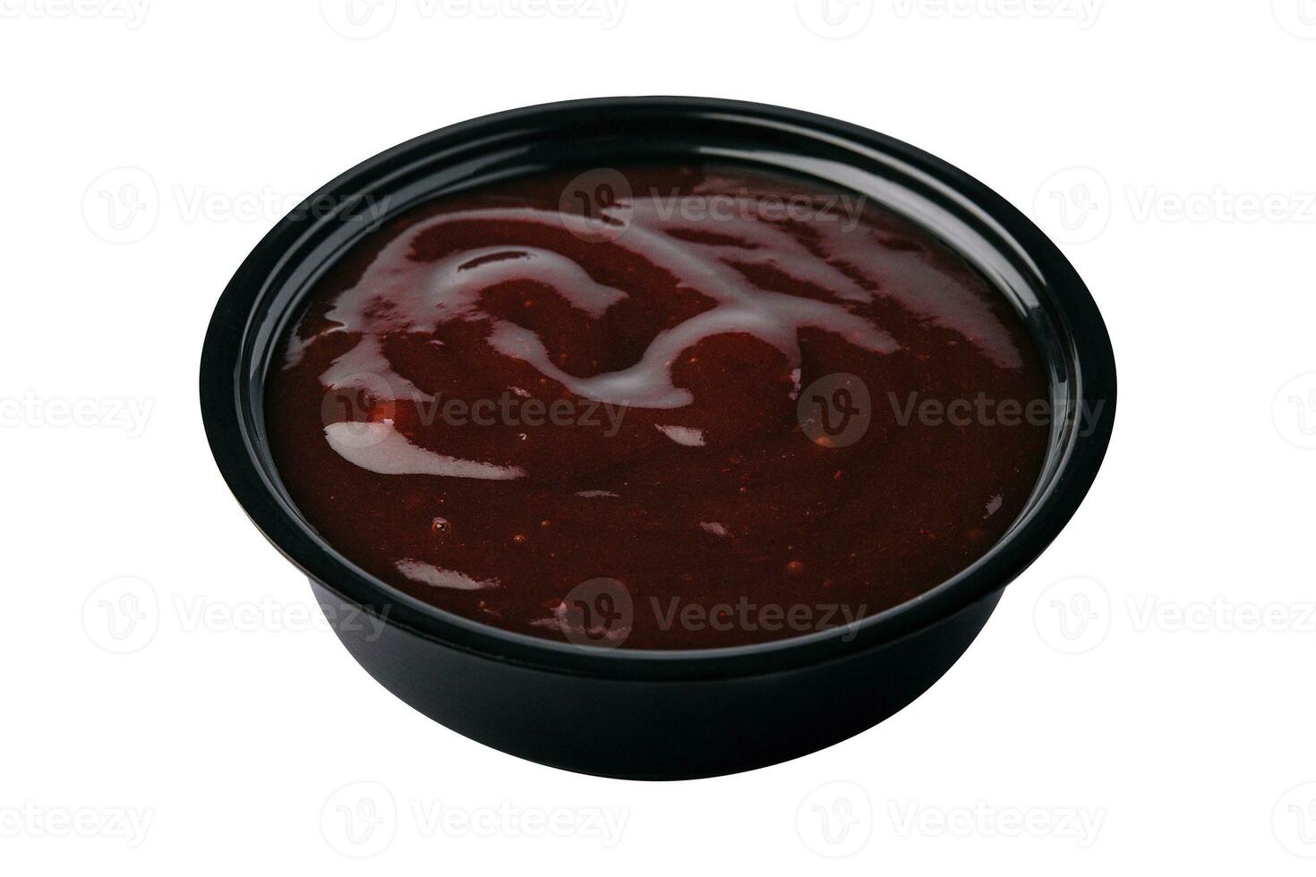 Barbecue sauce in bowl isolated on white background photo