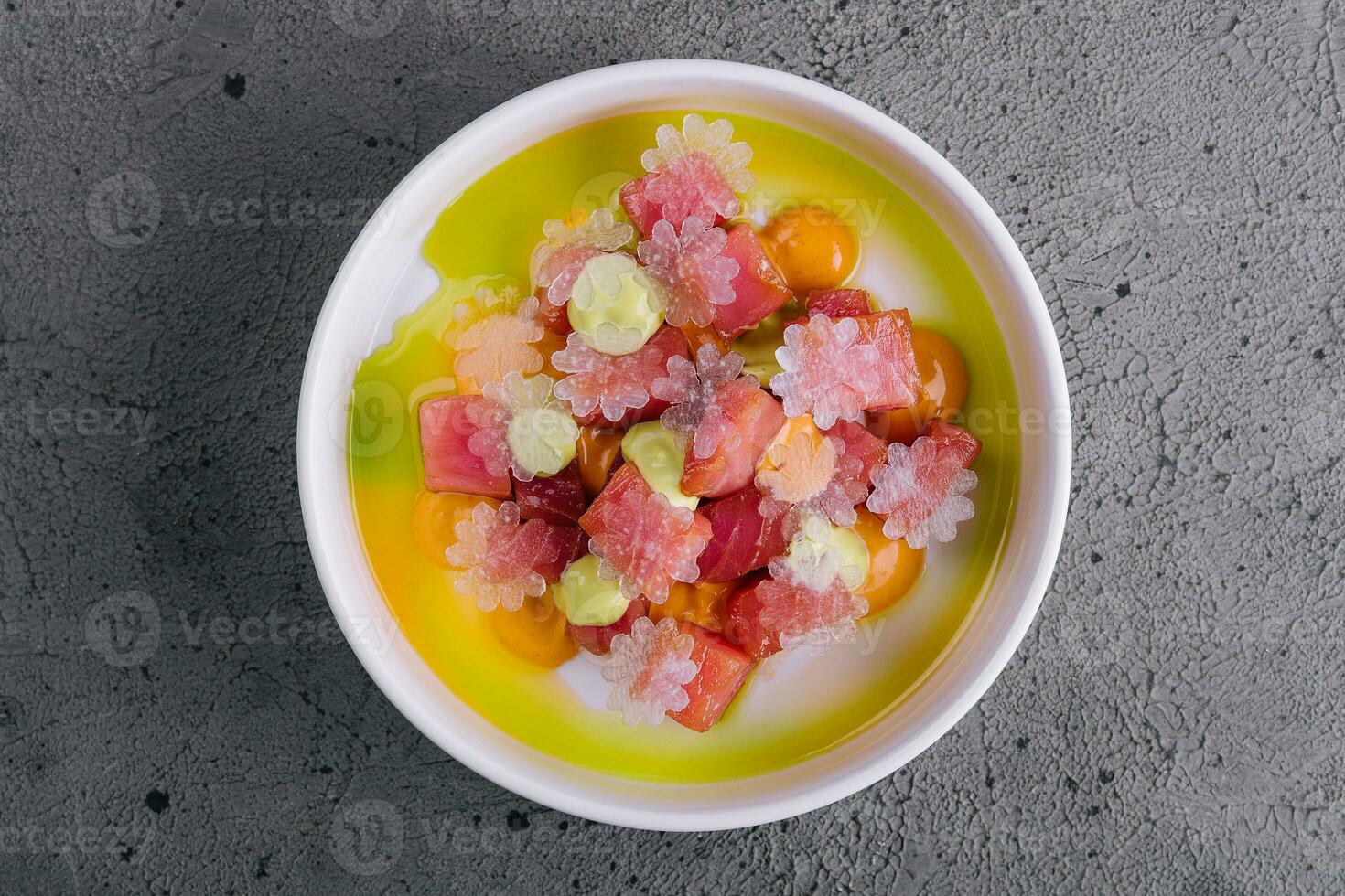 Tartar of tuna with lime snow on top view photo