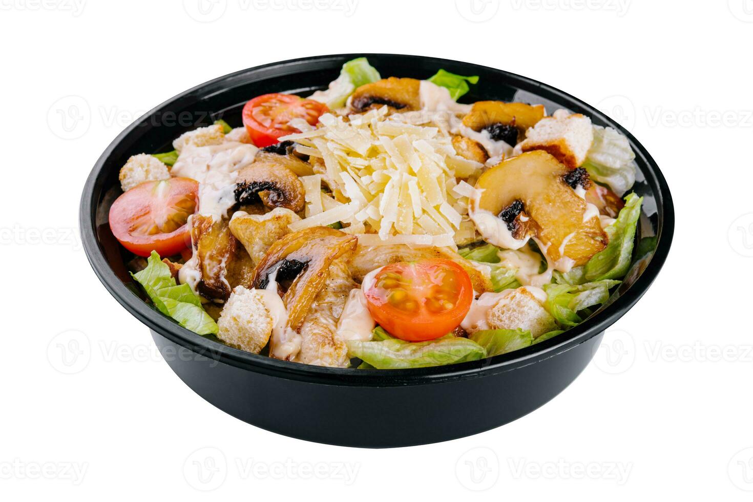 Warm salad with roasted chicken meat, vegetables and mushrooms photo