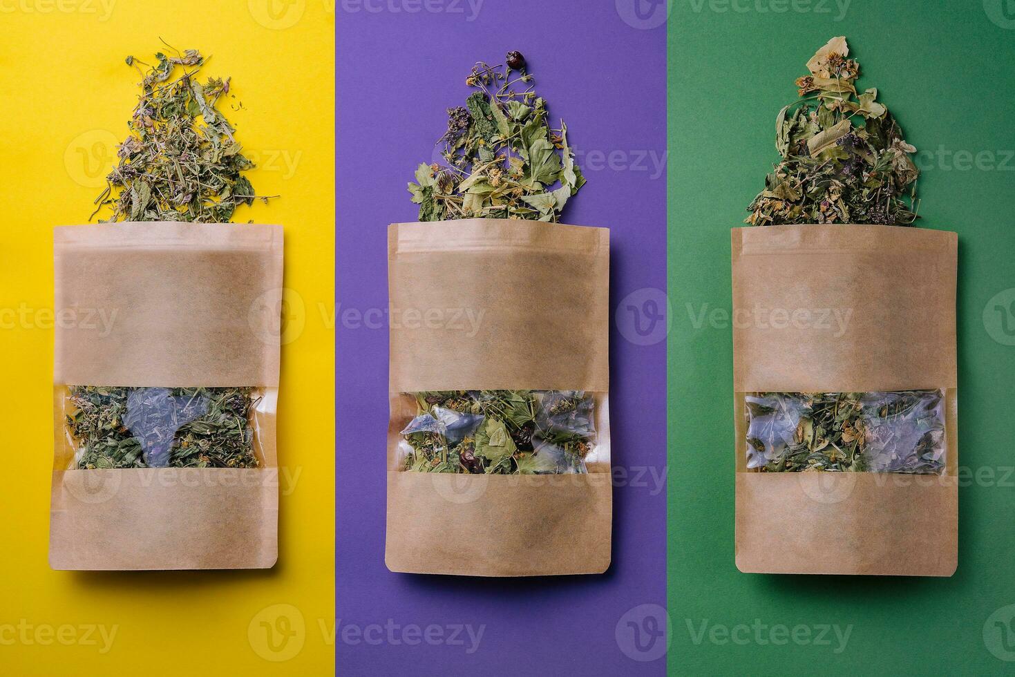 Paper bags with scattered different dried tea photo