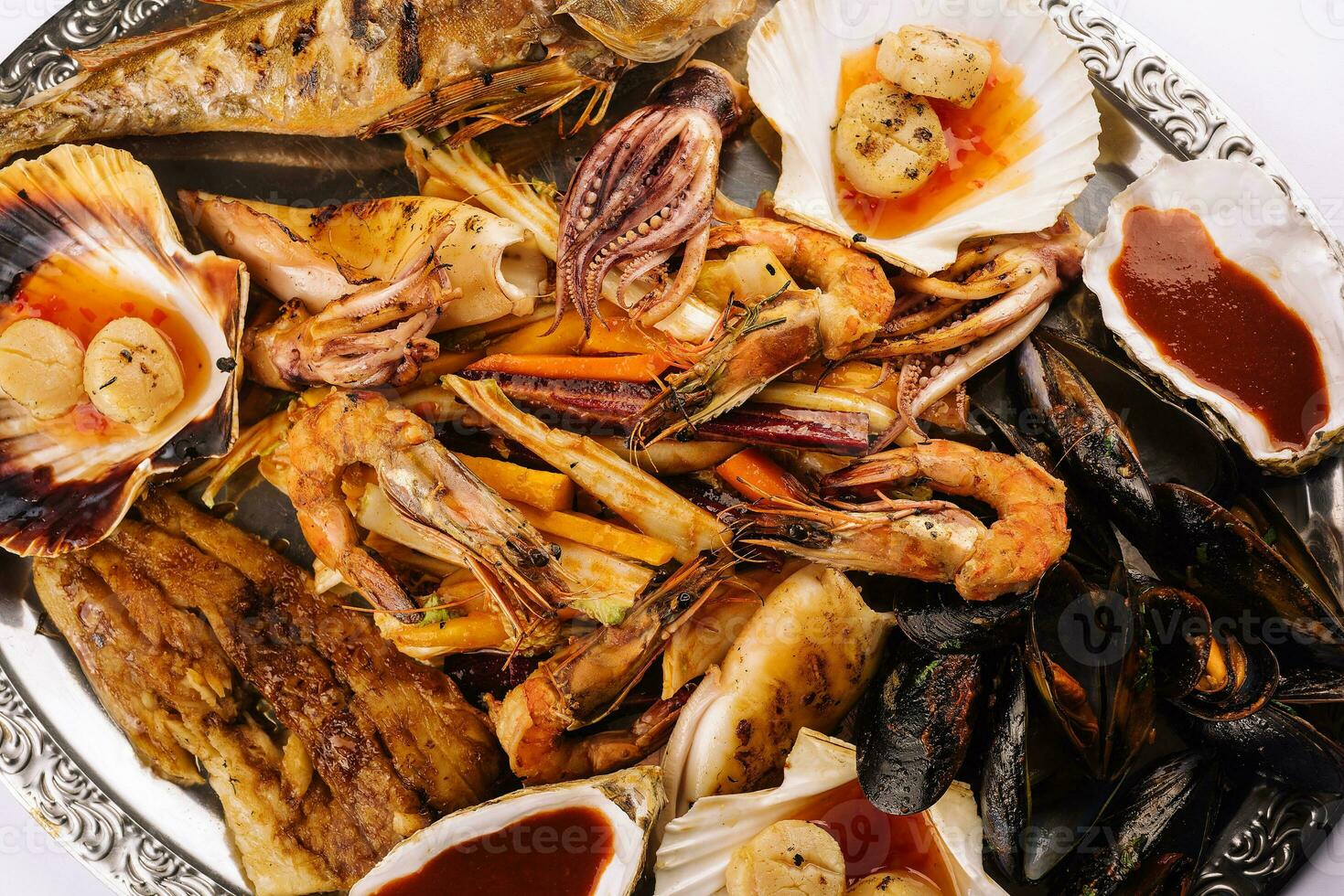 fresh shrimp, scampi, mussels, squid, octopus and scallops photo