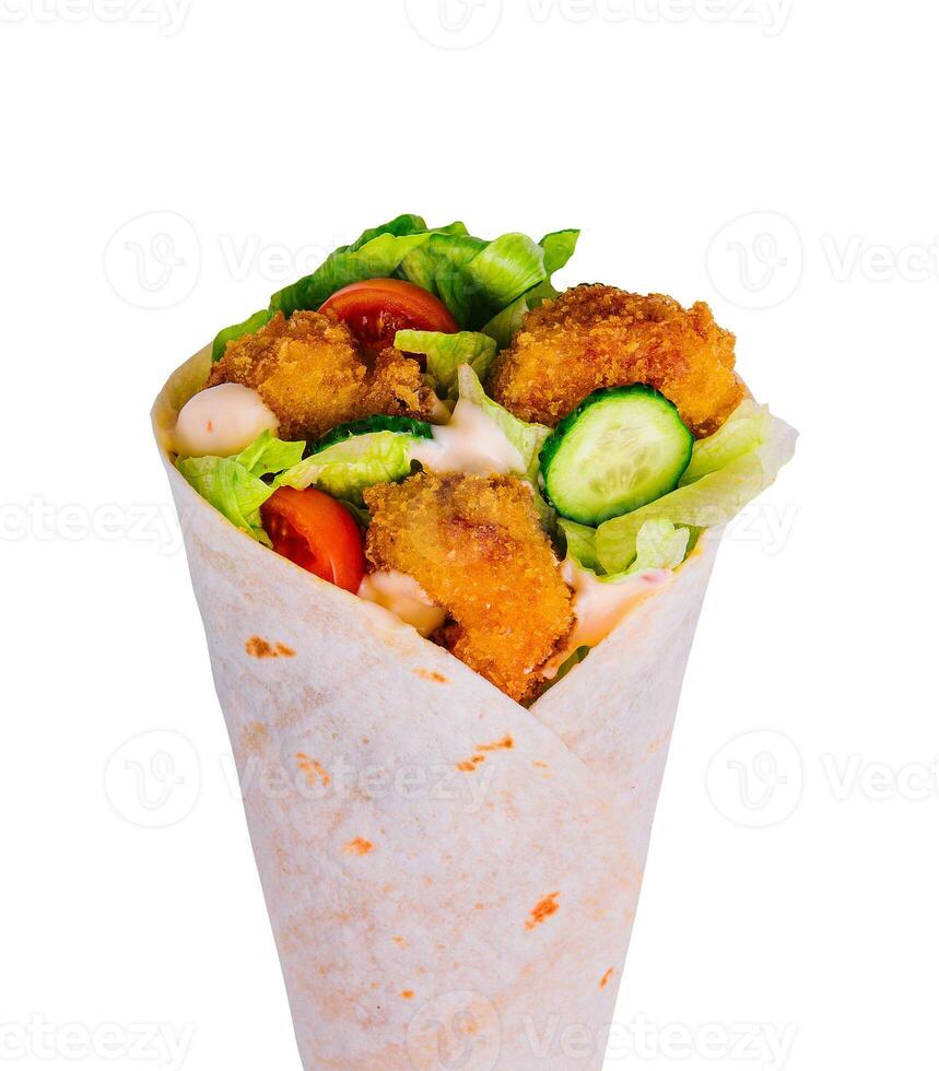 Fried chicken wrap in pita bread with fresh vegetables photo