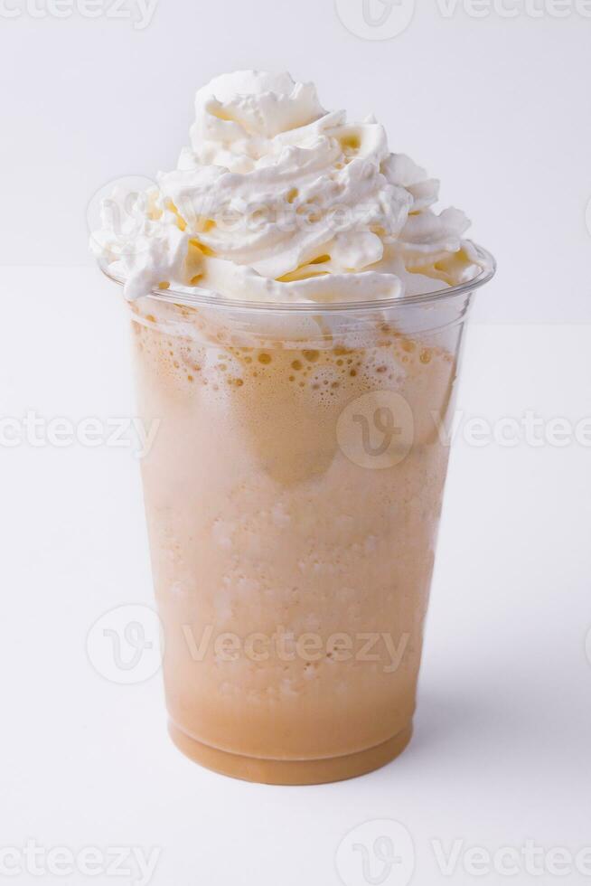 Chocolate milkshake with whipped cream on white photo