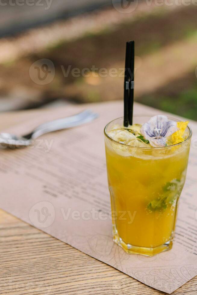 Summer chilled drinks with fresh juice on terrace bar photo