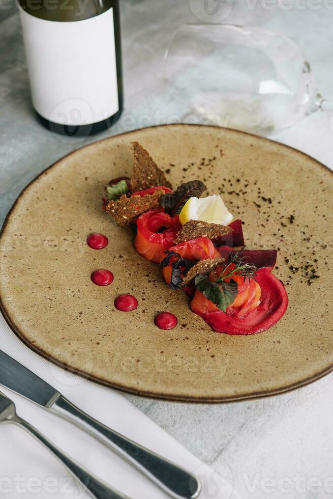 Salted salmon with beetroot sauce and wine photo