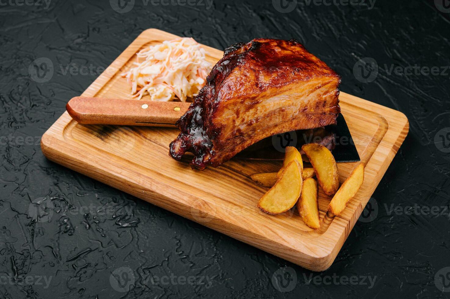 Barbecue pork ribs as main dish at restaurant photo