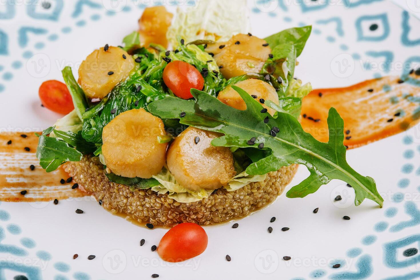 Scallops and Couscous with seaweed and arugula photo