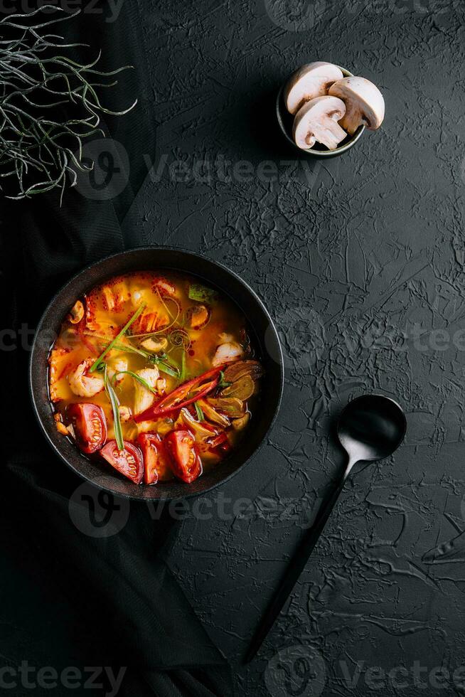 Tom Yum Goong - Thai hot and spicy soup photo