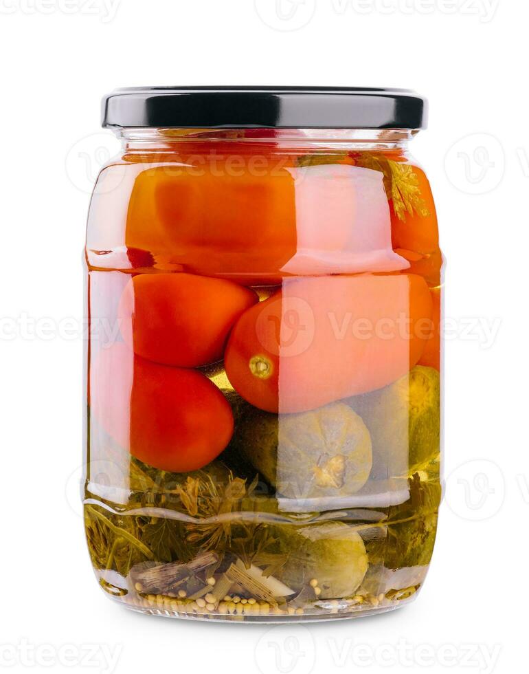 Salted cucumbers and tomatoes, in a glass jar photo