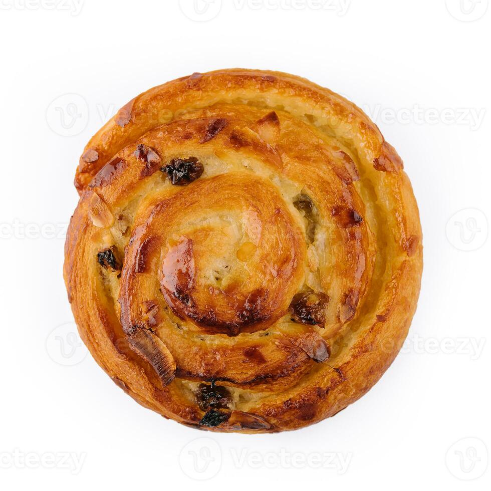 Homemade puff pastry bun with almond flakes photo