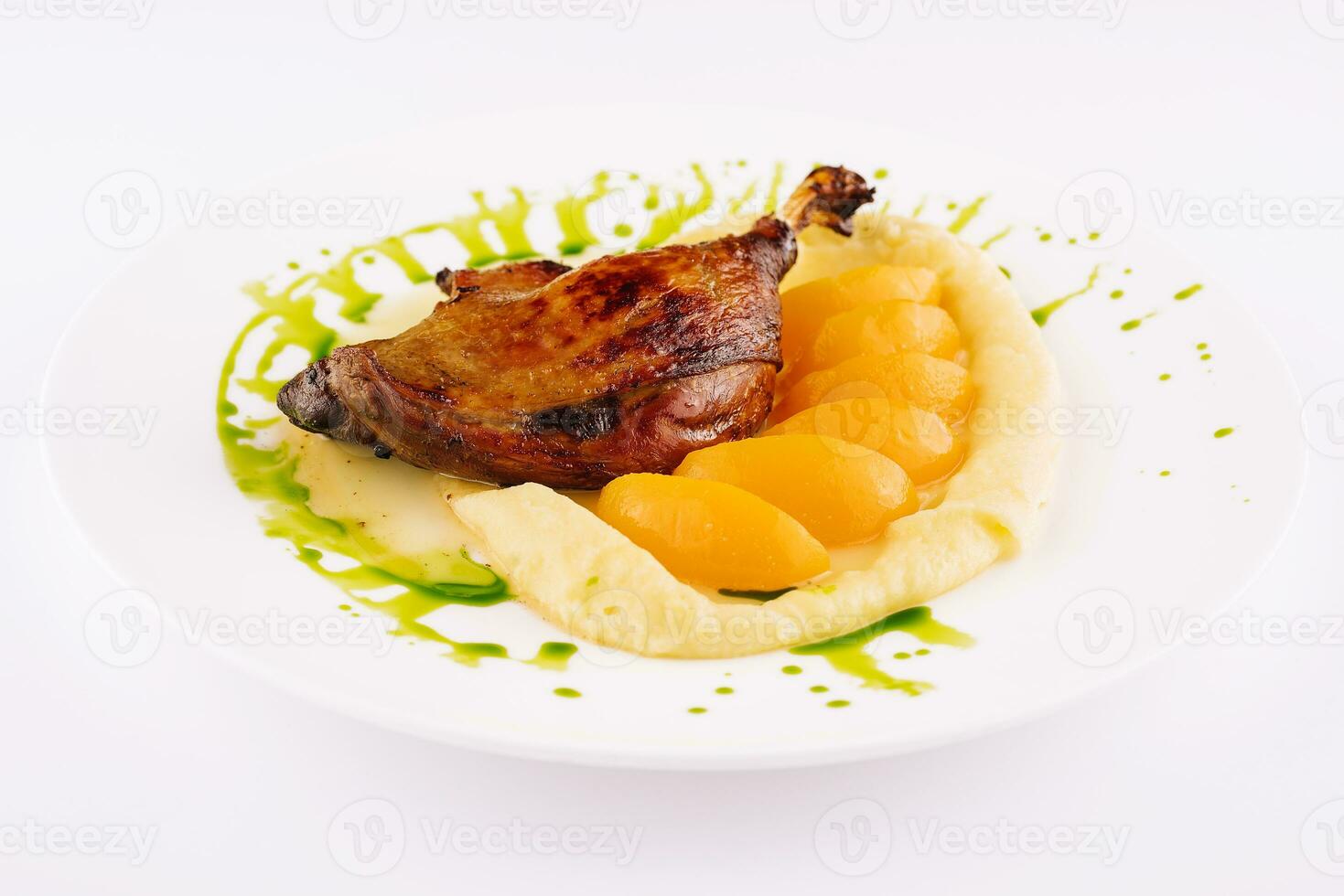 duck leg confit with mashed potatoes photo