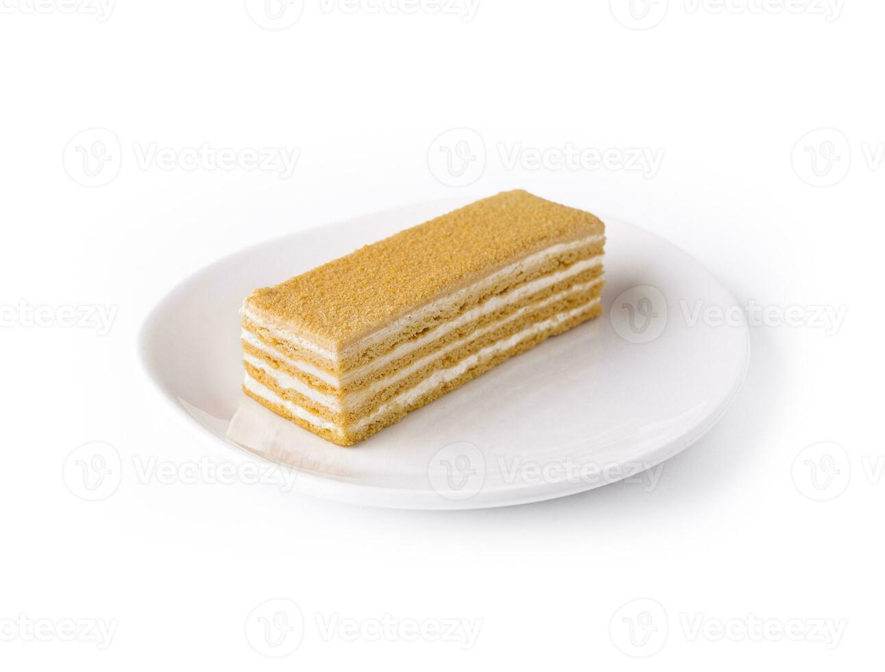 Napoleon slice cake of puff pastry with cream photo