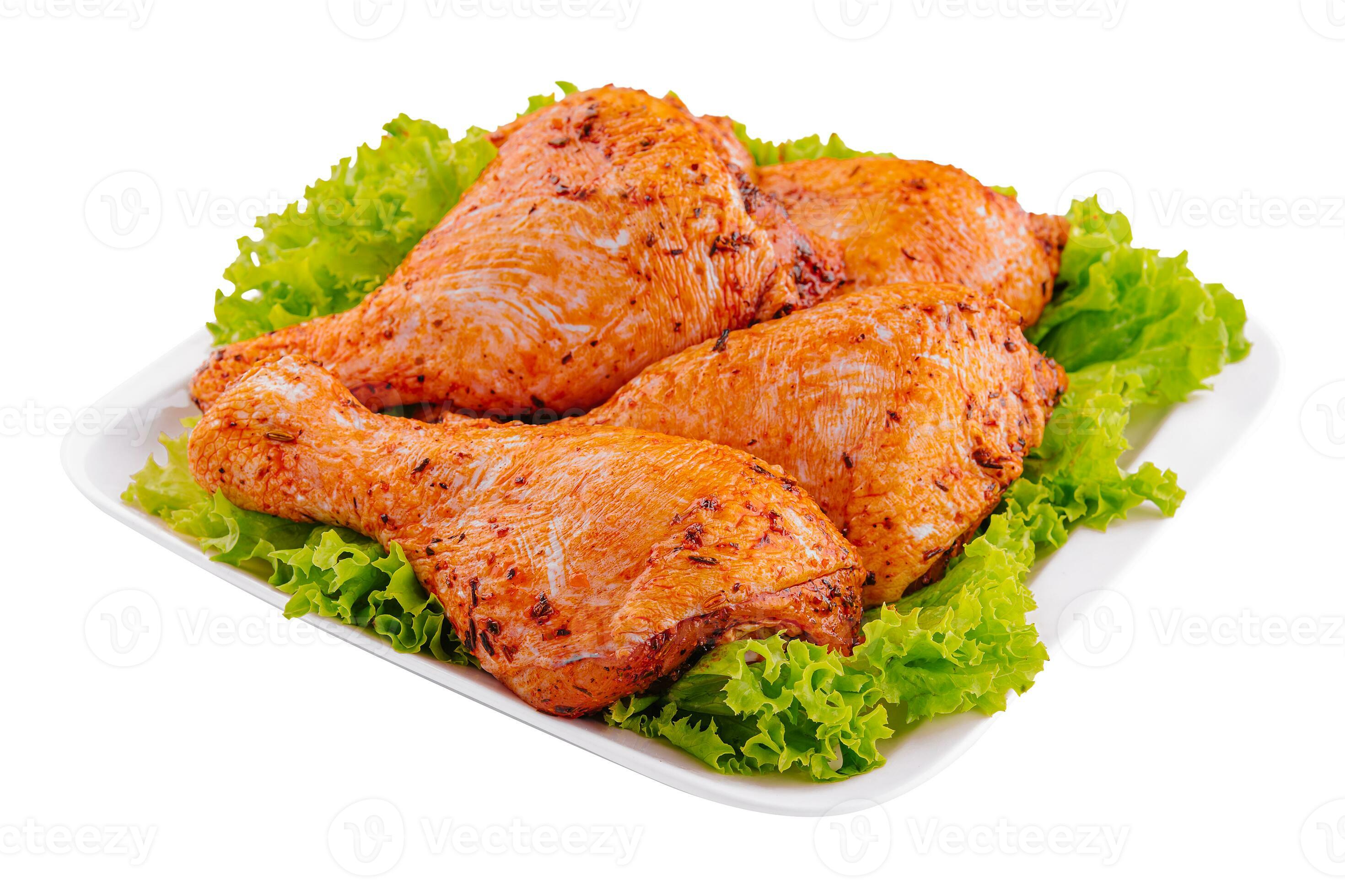 Raw uncooked marinated chicken legs on plate 30517358 Stock Photo at