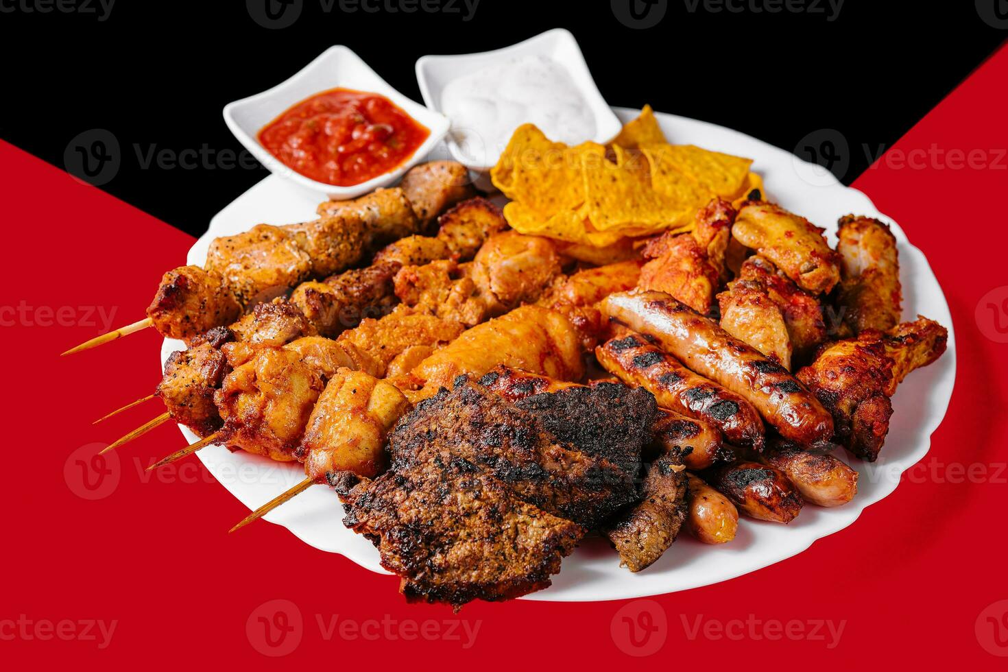 Assorted meat on a plate close up photo