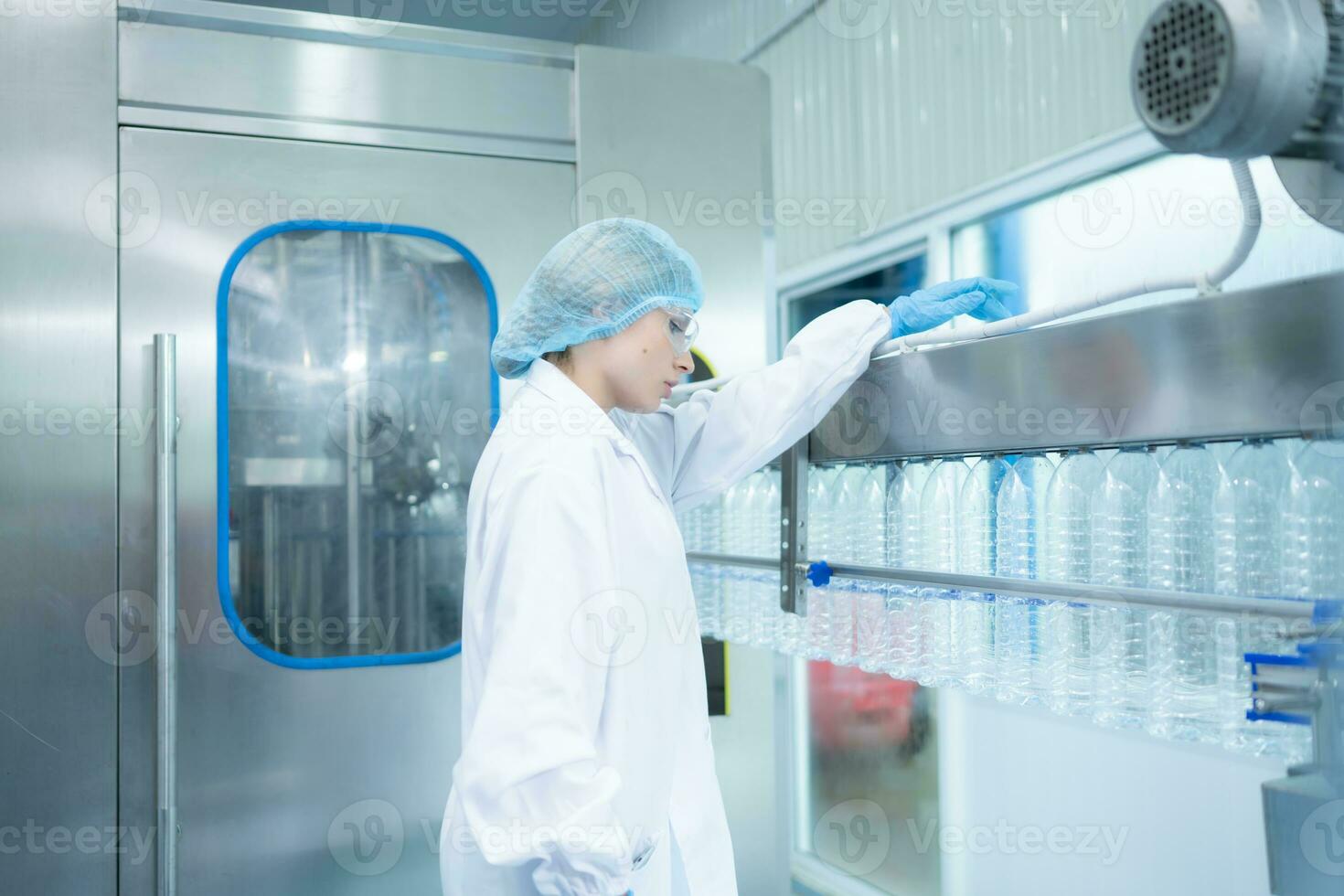 Fatigue female scientist working in a lab checking drinking water quality photo