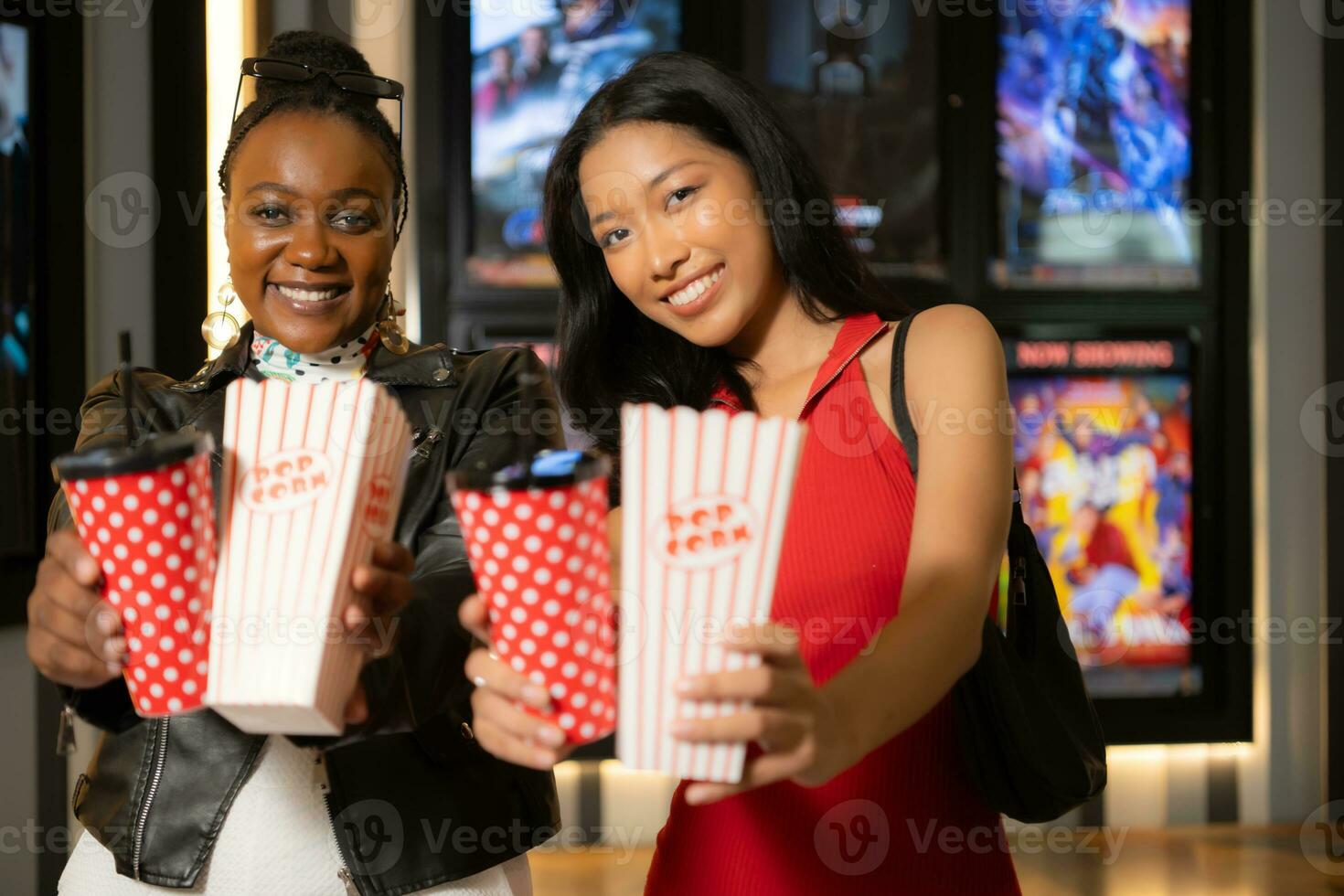 Popcorn and drinking glass a companion item of people for watching movies in the cinema. photo