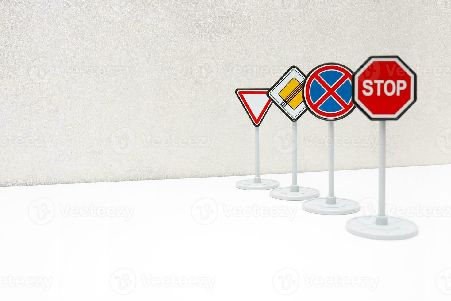 road signs in a row on a light background with copy space photo