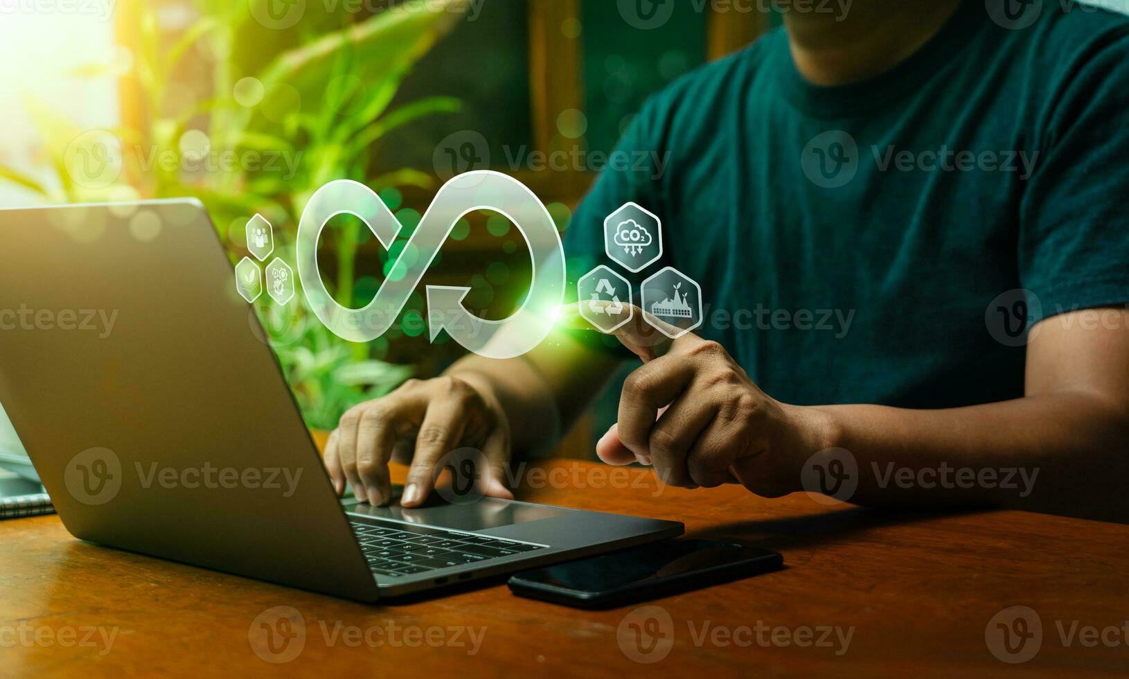 Businessman hold circular economy icon. economic system that aims to minimize waste and maximize resource efficiency, sustainable strategies to eliminate waste and pollution for future business growth photo