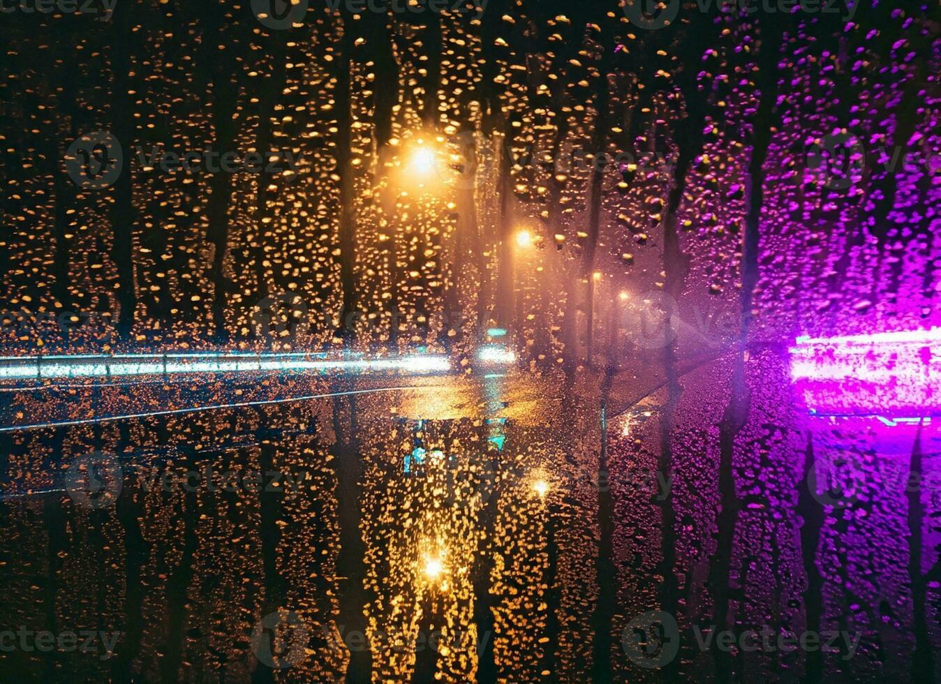 Rain on the street at night with lights photo