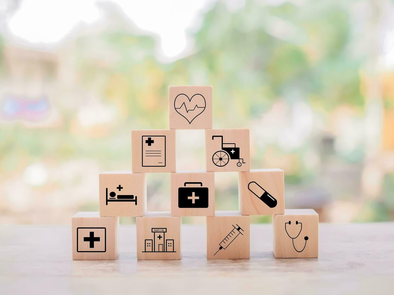 Wooden block with health care and medical icons set. photo