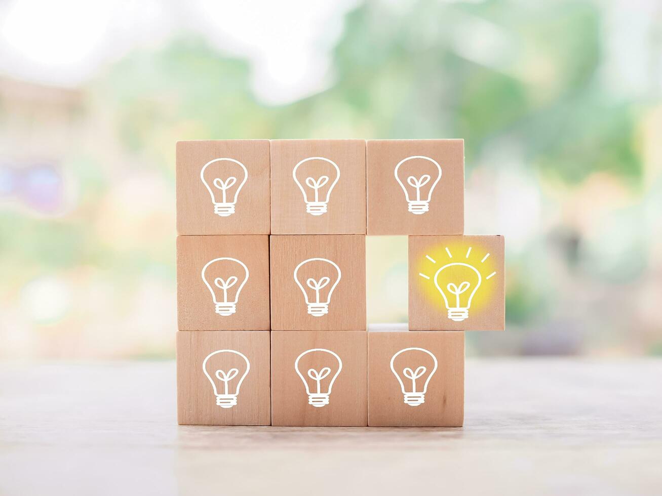 Wooden block with light bulb and wooden block with question mark for leadership, creative, idea, innovation concept. photo
