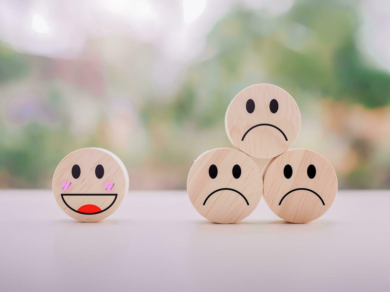 Emotion face wooden block. Customer service rating experience, feedback emotion and satisfaction survey. photo