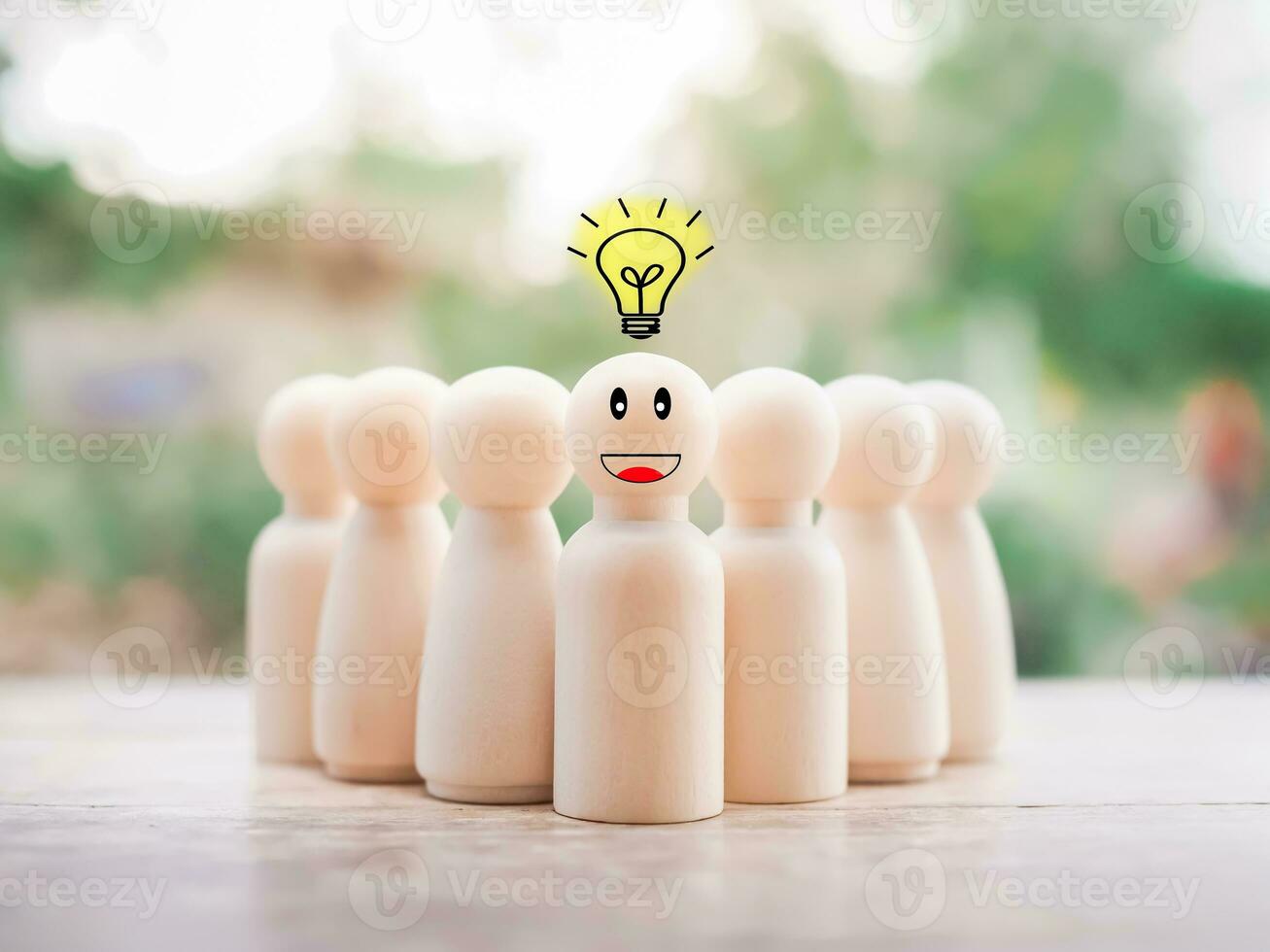 Wooden business figure with light bulb for leadership, creative, idea, innovation concept. photo