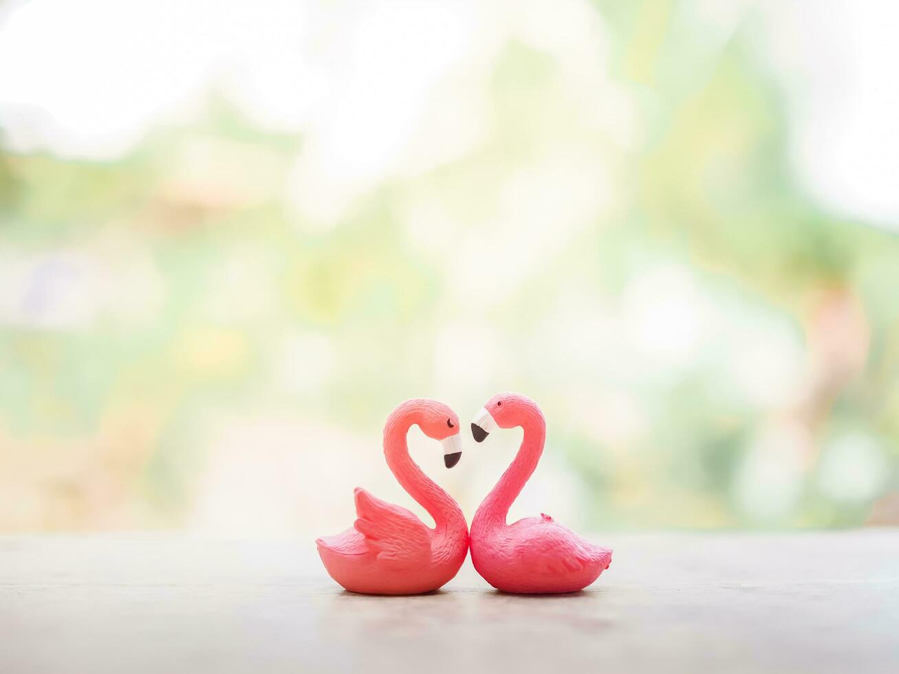 Flamingo couple in love with natural bacground for Valentine's day or Wedding concept photo