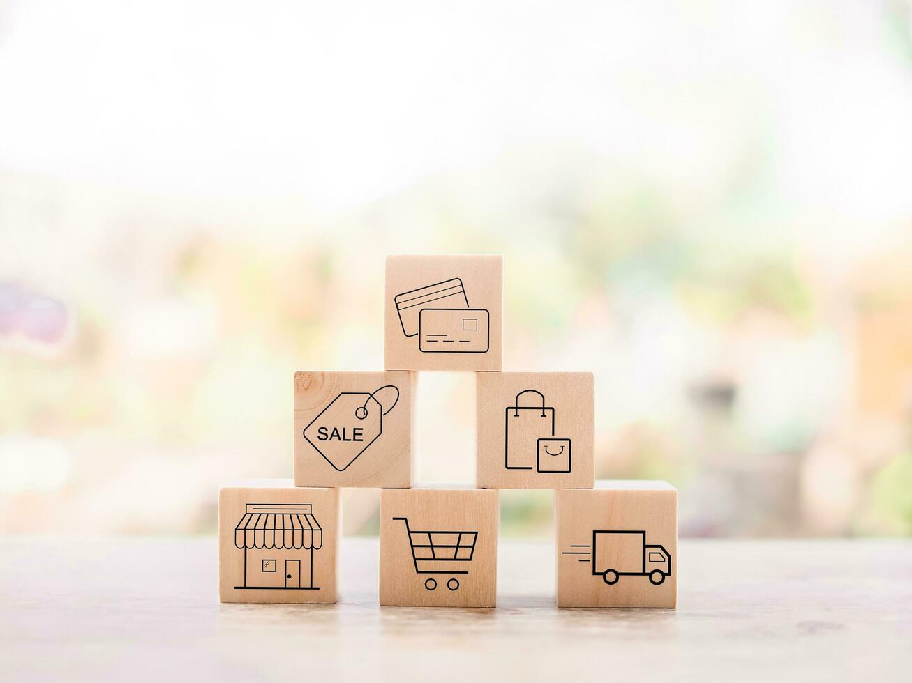 Wooden block with online shopping and e-commerce icons set. photo