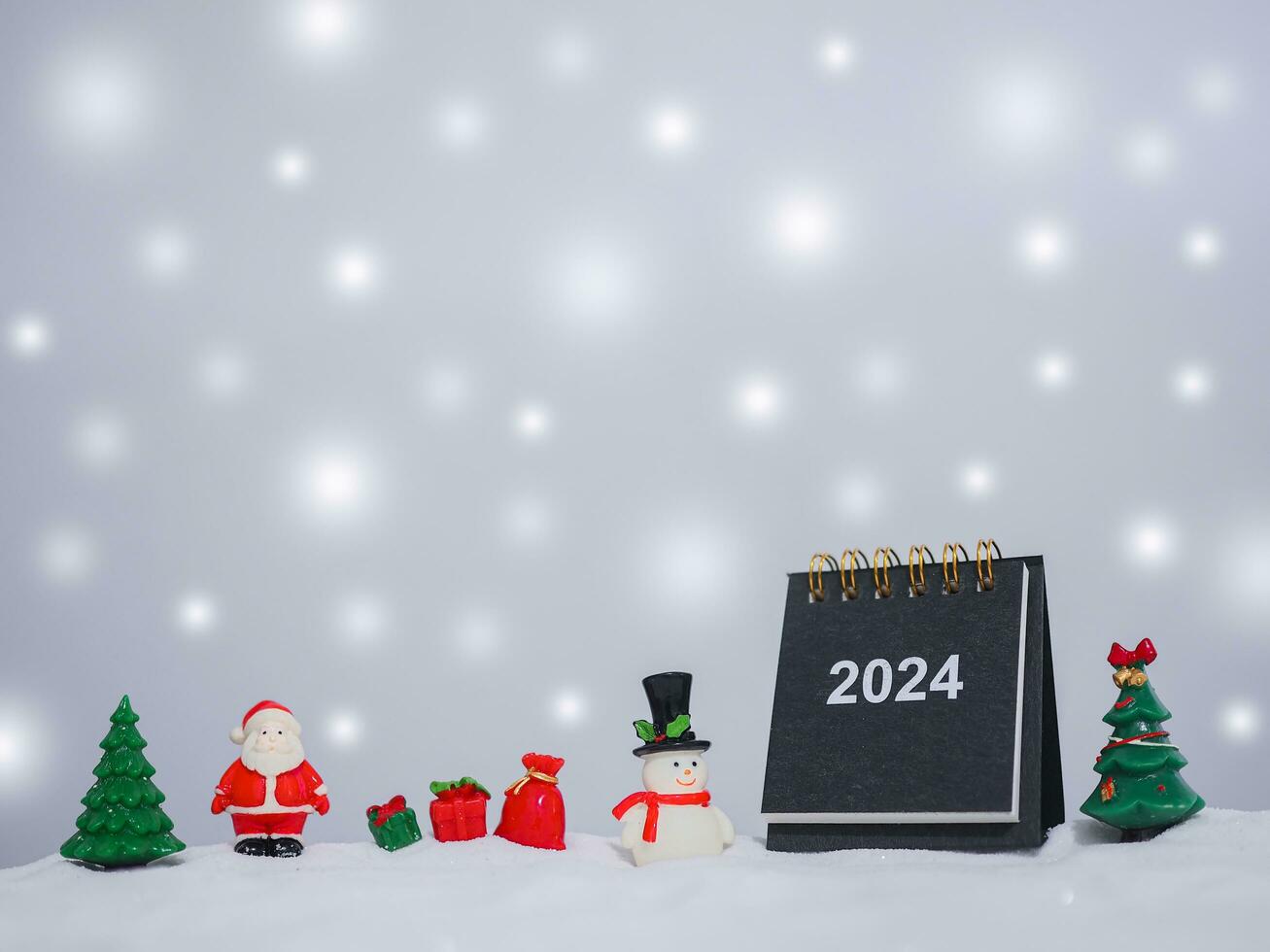 Close up calendar and christmas decoration with shiny light for New Year and Christmas 2024 concept. photo