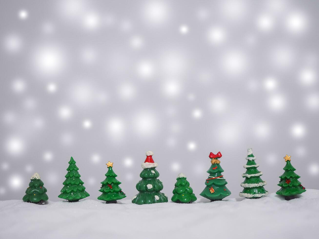 Christmas tree with shiny light for Christmas and New Year holidays background, Winter season, falling snow, Copy space for Christmas and New Year holidays greeting card. photo