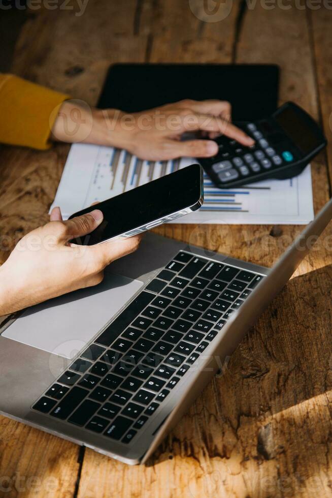 Business Man Financial Inspector and Secretary Making Report, Calculating or Checking Balance. Internal Revenue Service Inspector Checking Document Audit Concept photo