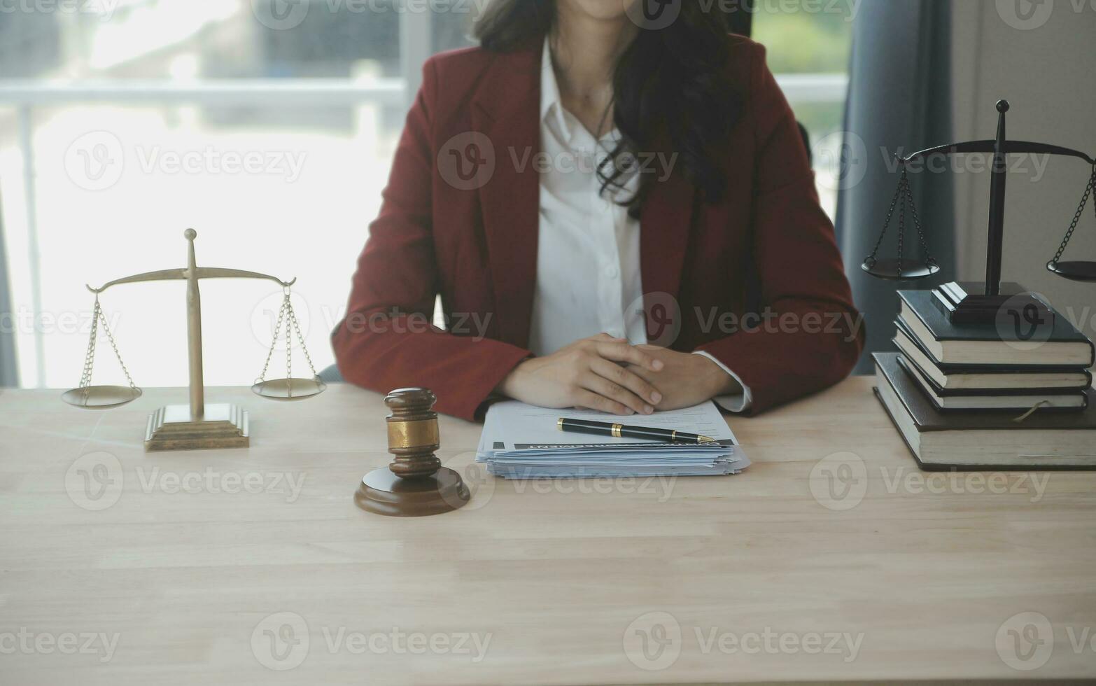 Business and lawyers discussing contract papers with brass scale on desk in office. Law, legal services, advice, justice and law concept picture with film grain effect photo