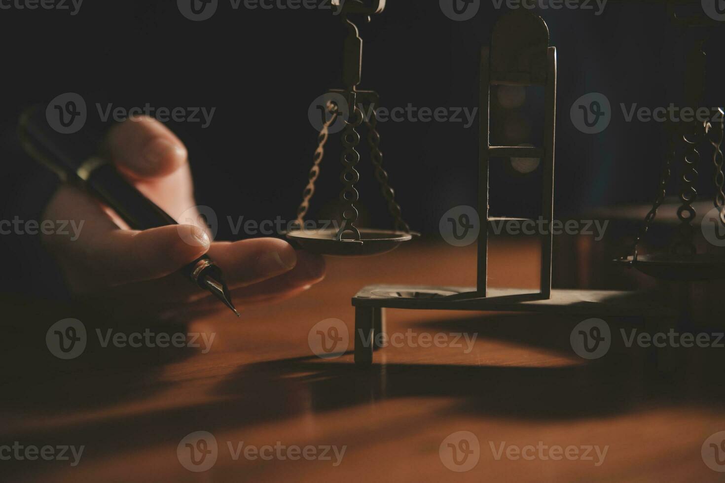 Business and lawyers discussing contract papers with brass scale on desk in office. Law, legal services, advice, justice and law concept picture with film grain effect photo