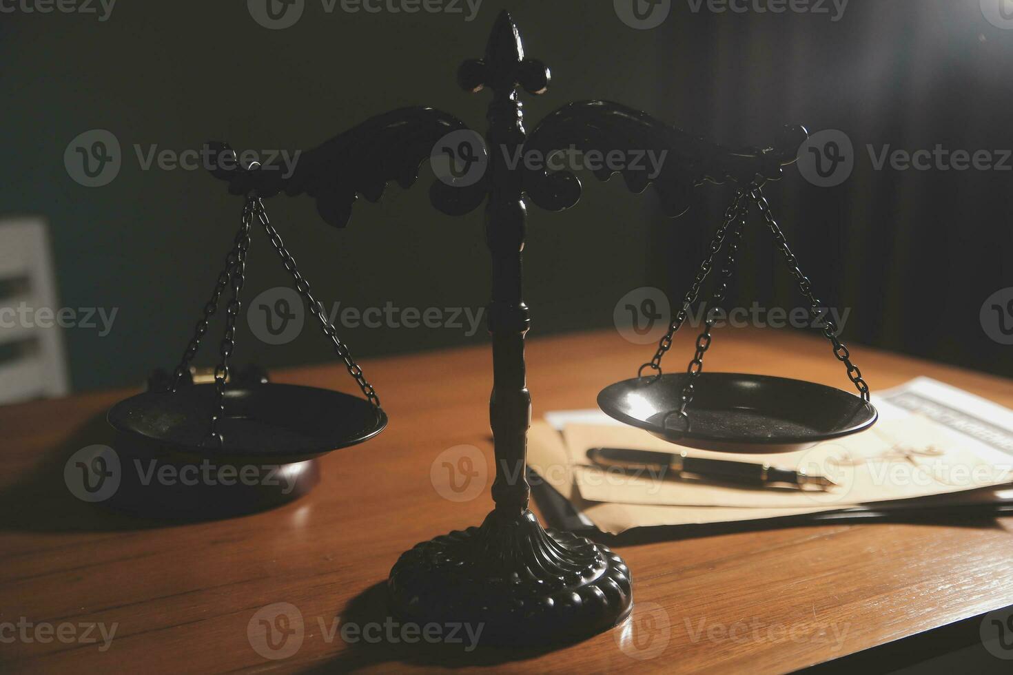 Business and lawyers discussing contract papers with brass scale on desk in office. Law, legal services, advice, justice and law concept picture with film grain effect photo