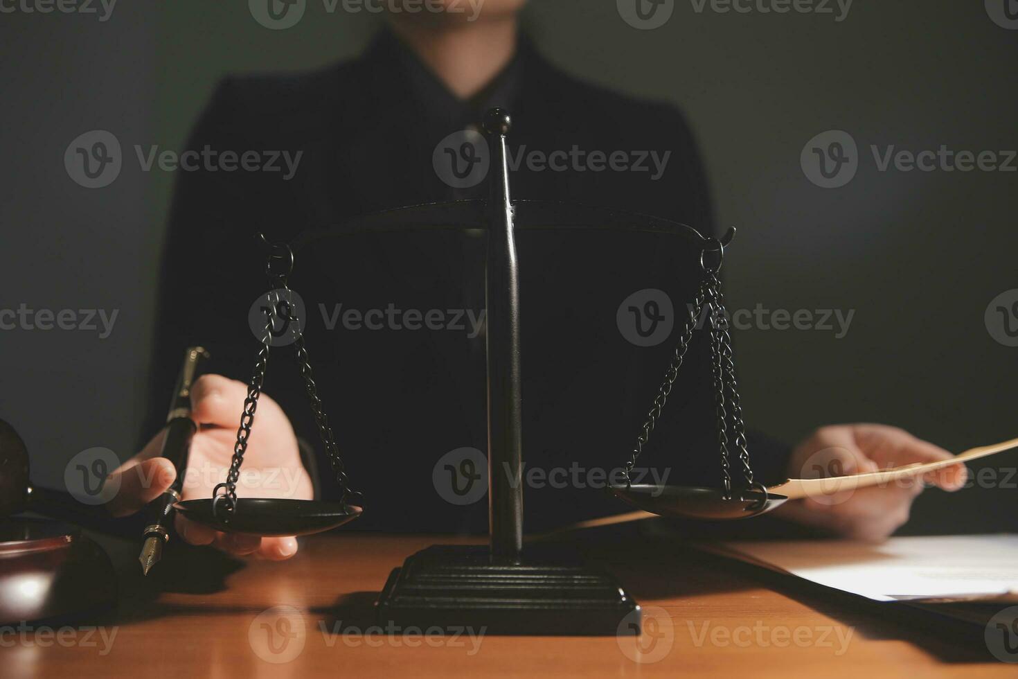Business and lawyers discussing contract papers with brass scale on desk in office. Law, legal services, advice, justice and law concept picture with film grain effect photo