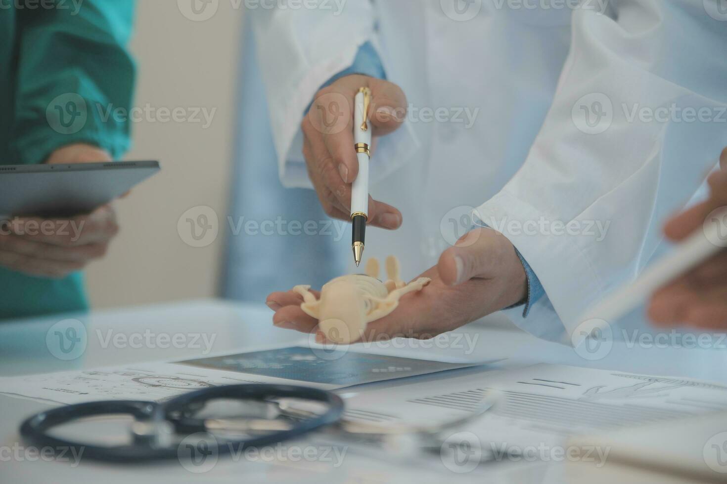 international team of professional doctors having a meeting in conference room at the modern hospital. Healthcare and medical development concept. photo