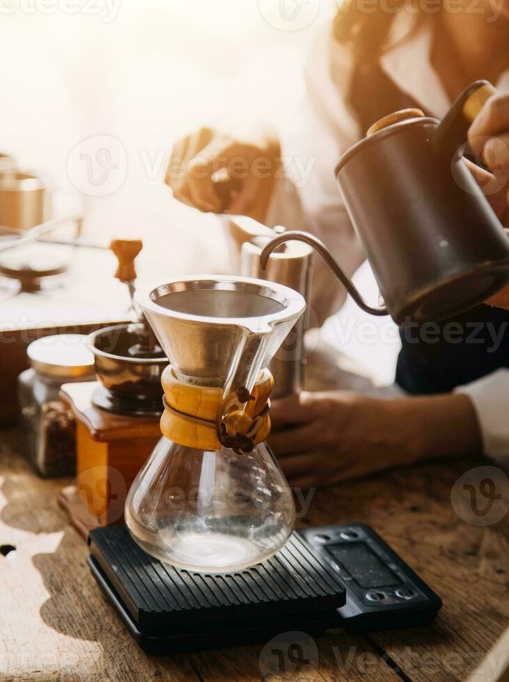 Happy young adult couple making breakfast and drinking coffee together in cozy home kitchen in morning at home. Preparing meal and smiling. Lifestyle, leisure and Love concept. photo