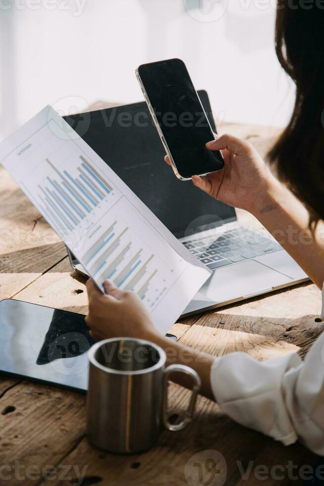 Business Man Financial Inspector and Secretary Making Report, Calculating or Checking Balance. Internal Revenue Service Inspector Checking Document Audit Concept photo