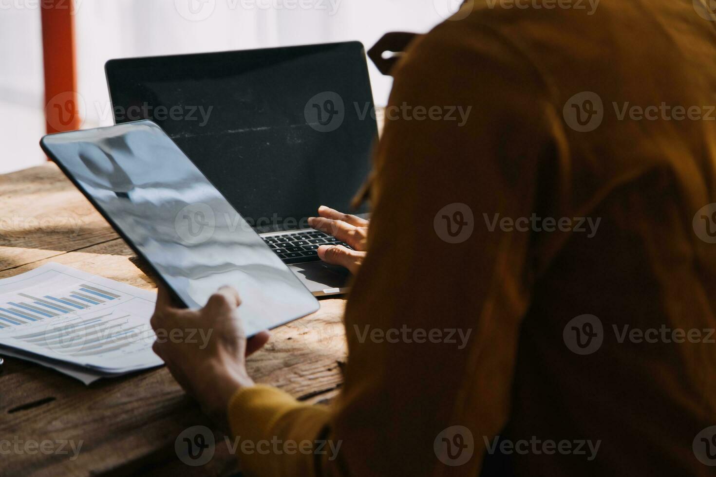 Business Man Financial Inspector and Secretary Making Report, Calculating or Checking Balance. Internal Revenue Service Inspector Checking Document Audit Concept photo