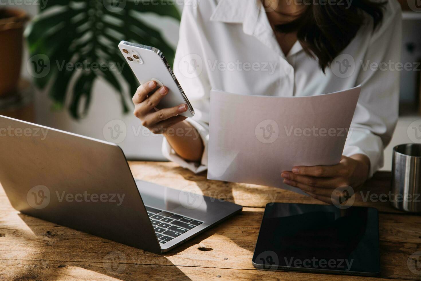 Business Man Financial Inspector and Secretary Making Report, Calculating or Checking Balance. Internal Revenue Service Inspector Checking Document Audit Concept photo