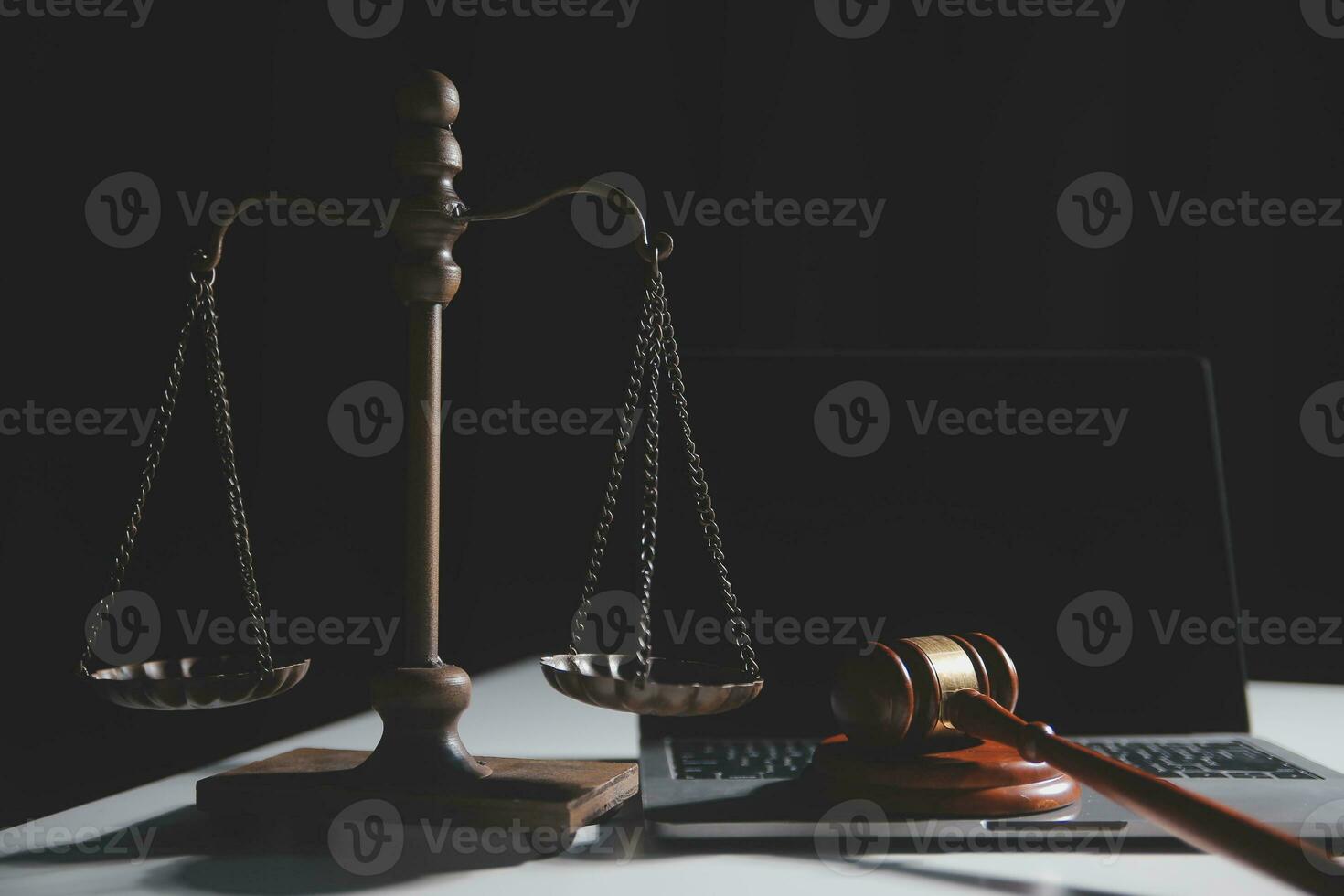 Business and lawyers discussing contract papers with brass scale on desk in office. Law, legal services, advice, justice and law concept picture with film grain effect photo