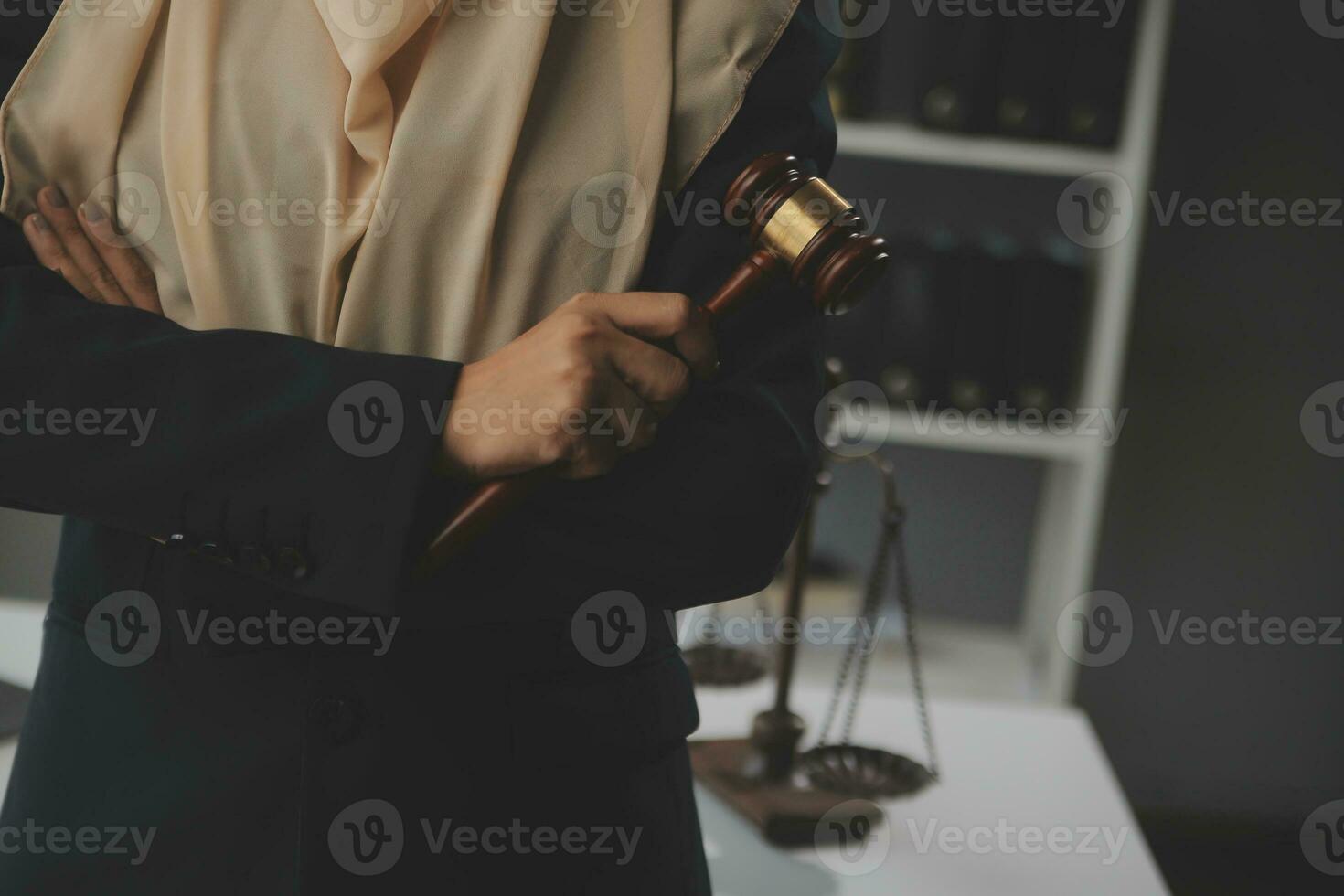 Business and lawyers discussing contract papers with brass scale on desk in office. Law, legal services, advice, justice and law concept picture with film grain effect photo