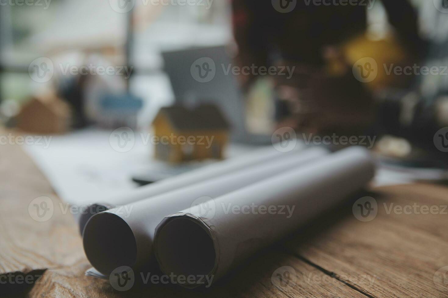 Engineer Teamwork Meeting, Drawing working on blueprint meeting for project working with partner on model building and engineering tools in working site, Construction and structure concept. photo