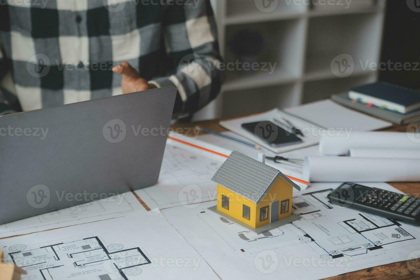 Engineer Teamwork Meeting, Drawing working on blueprint meeting for project working with partner on model building and engineering tools in working site, Construction and structure concept. photo