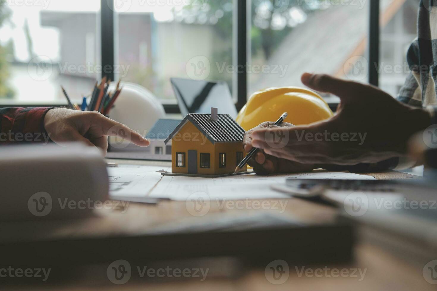 Engineer Teamwork Meeting, Drawing working on blueprint meeting for project working with partner on model building and engineering tools in working site, Construction and structure concept. photo