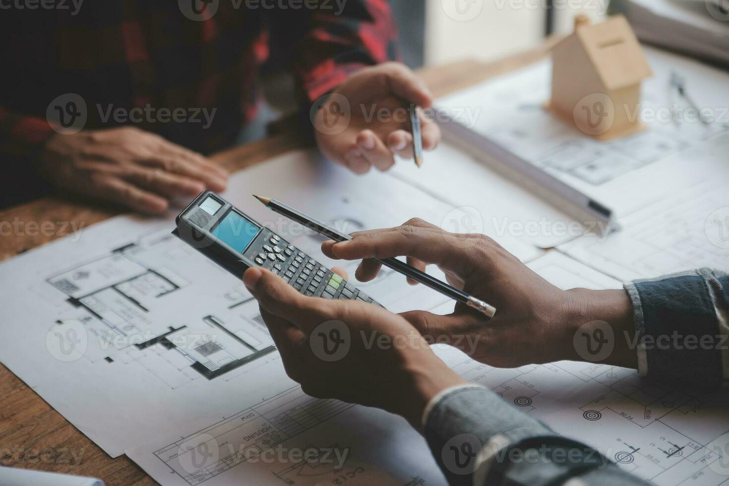 Engineer Teamwork Meeting, Drawing working on blueprint meeting for project working with partner on model building and engineering tools in working site, Construction and structure concept. photo