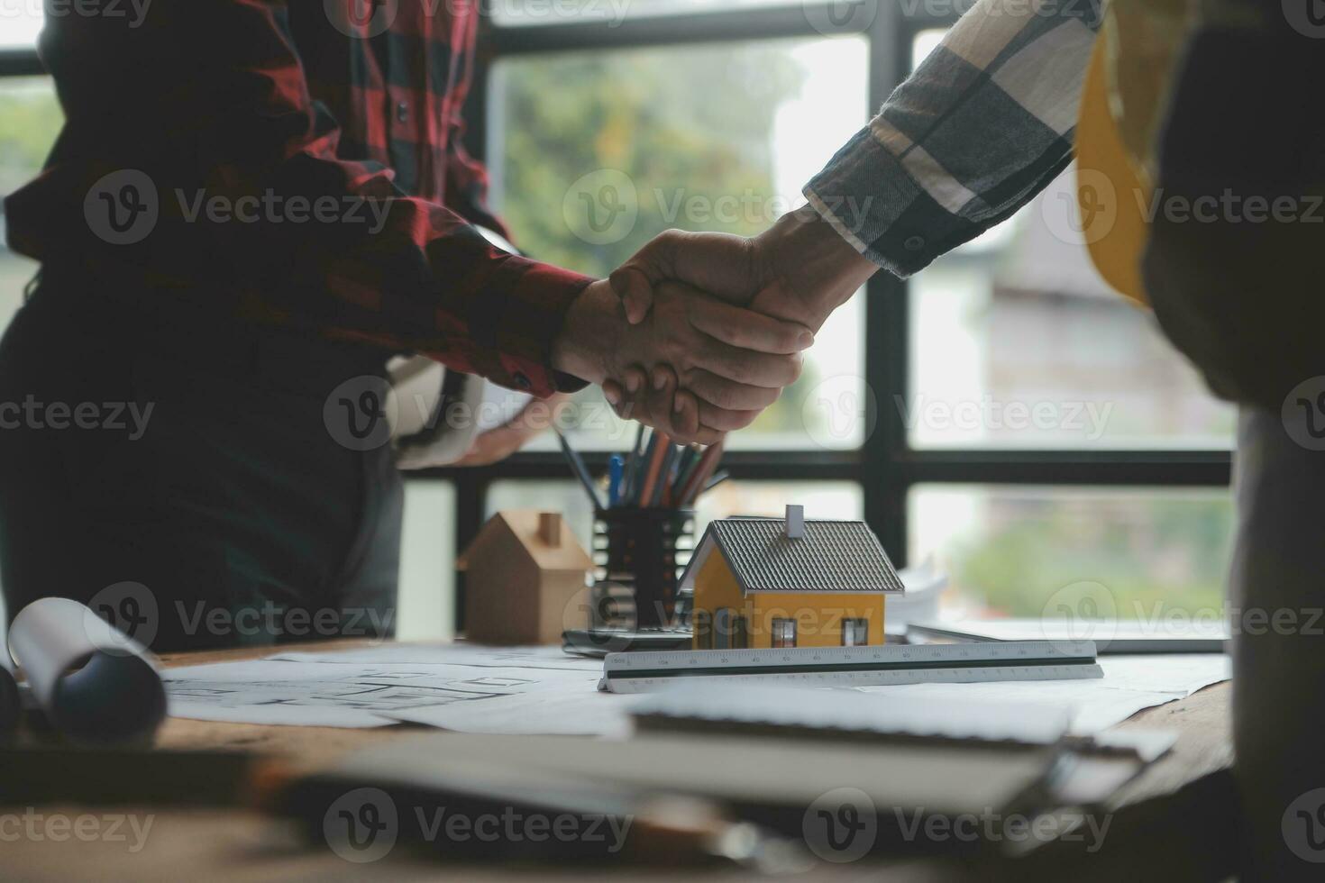 Engineer Teamwork Meeting, Drawing working on blueprint meeting for project working with partner on model building and engineering tools in working site, Construction and structure concept. photo